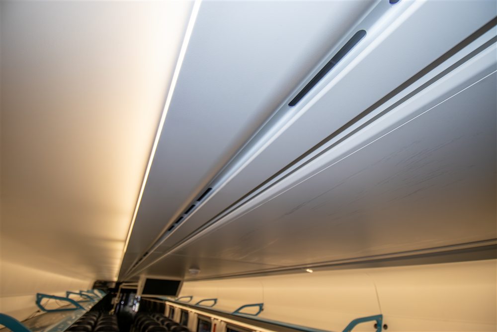 Overhead air-distribution interface inside the rail interior